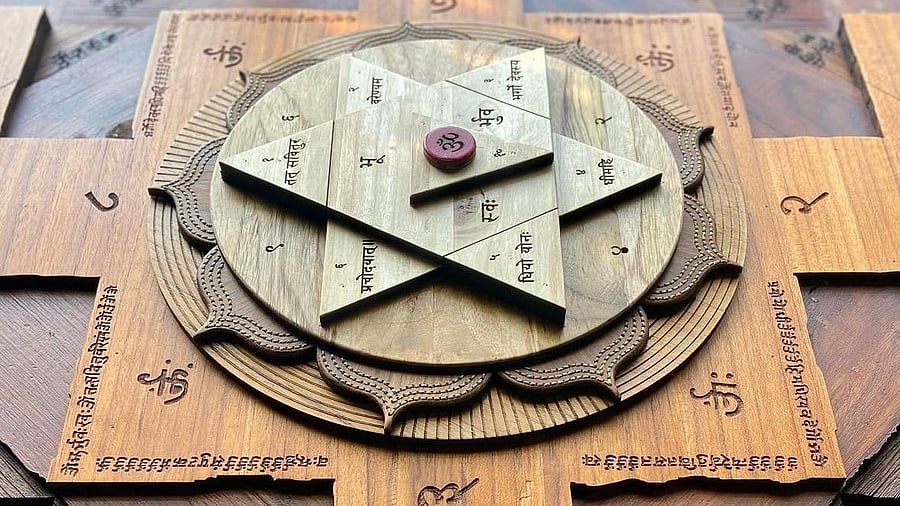 Gayatri Mantra-inscribed wall piece, curated by Anubha.