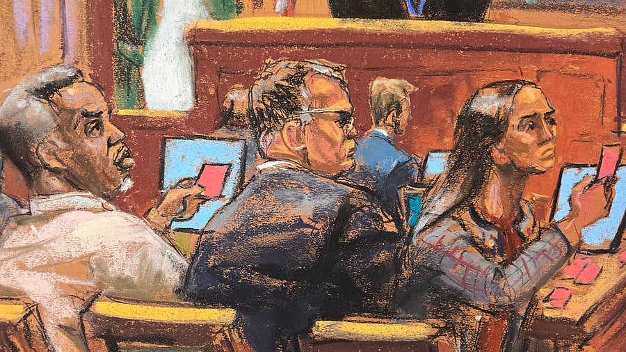 <div class="paragraphs"><p>Sean "Diddy" Combs and his defense team pass notes during the cross examination of Casandra "Cassie" Ventura during Combs' sex trafficking trial in New York City, New York.</p></div>