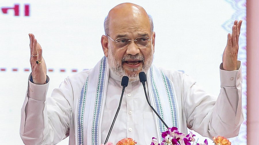 <div class="paragraphs"><p>Union Home Minister Amit Shah addresses the gathering during the inauguration of a newly developed lake and various other projects of GMC and the Department of Posts, in Gandhinagar, Saturday, May 17, 2025.</p></div>
