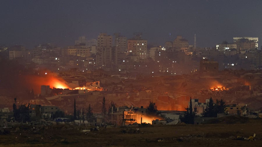 <div class="paragraphs"><p>Flames rise from  Gaza, as seen from the Israeli side of the Israel-Gaza border.</p></div>