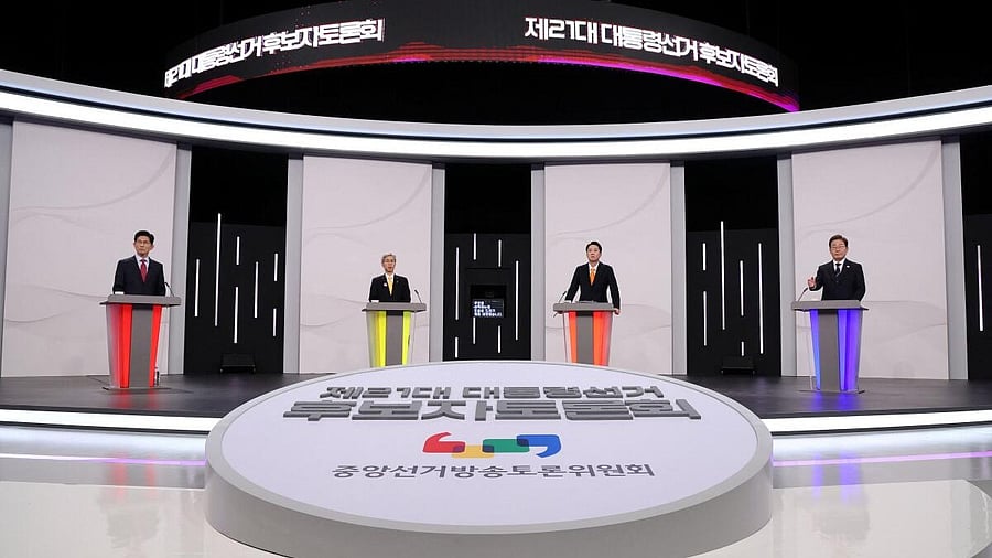 <div class="paragraphs"><p>South Korea's presidential candidates, Kim Moon Soo of the People Power Party, Kwon Young-guk of the Democratic Labor Party, Lee Jun-seok of the New Reform Party and Lee Jae-myung of the Democratic Party pose for photograph ahead of a televised presidential debate for the forthcoming June 3 presidential election at SBS studio on May 18, 2025 in Seoul, South Korea.</p></div>