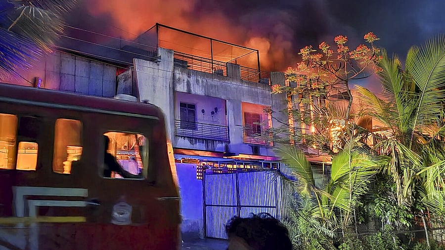 <div class="paragraphs"><p>Smoke billows after a fire broke out at a factory, at MIDC area in Solapur, Maharashtra, Sunday, May 18, 2025.</p></div>