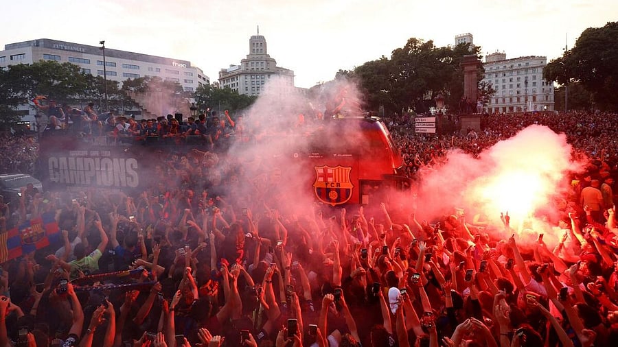 <div class="paragraphs"><p>FC Barcelona celebrate winning LaLiga.</p></div>
