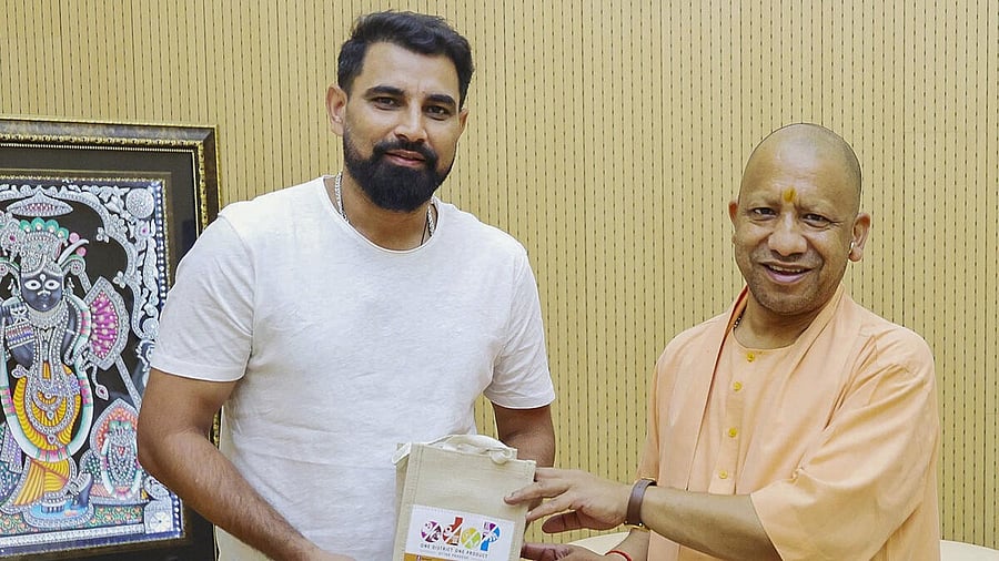 <div class="paragraphs"><p>Mohammed Shami meets Yogi Adityanath</p><p></p></div>