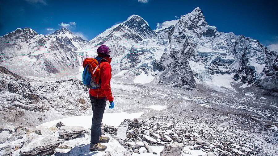 <div class="paragraphs"><p>Representative image showing a person looking at the&nbsp;Lhotse peak </p></div>