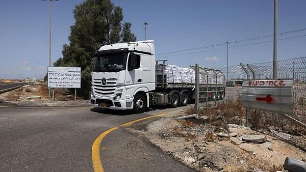 <div class="paragraphs"><p>A truck carrying aid, makes its way to Gaza, May 19, 2025.</p></div>