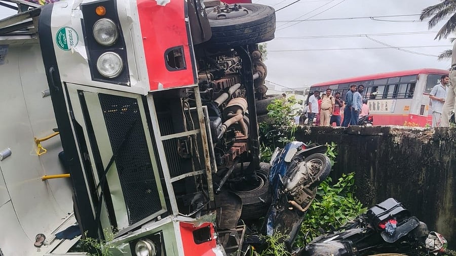 <div class="paragraphs"><p>The bus fell into a drain near Kaggalipura, in Ramanagara district. </p></div>