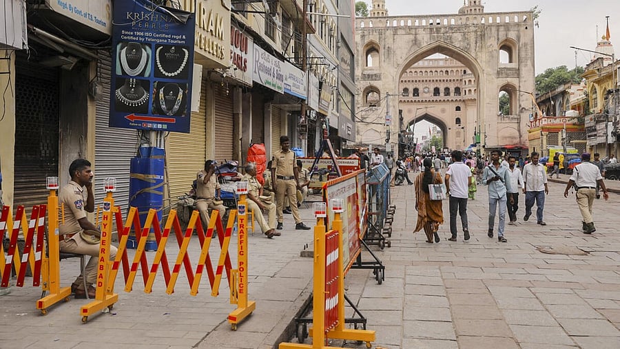 <div class="paragraphs"><p>Police personnel deployed near the building where a fire broke out on Sunday, near Charminar, in Hyderabad.</p></div>