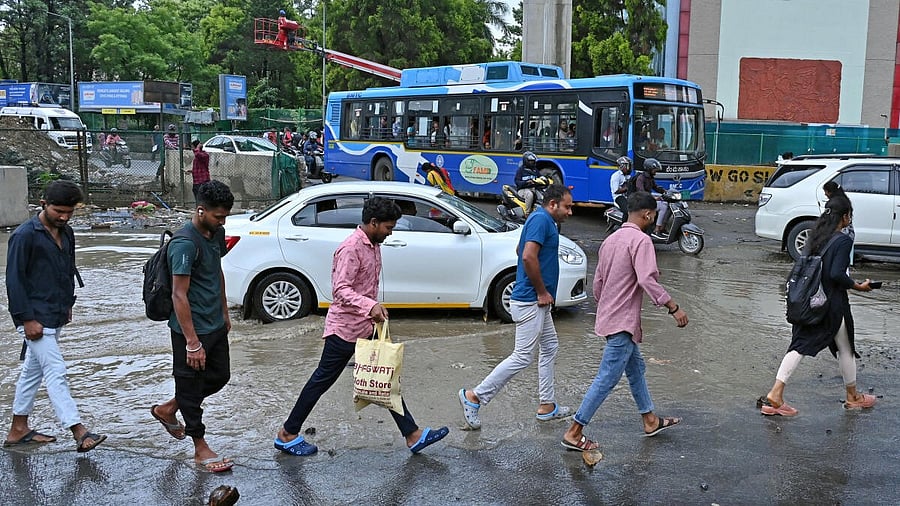 <div class="paragraphs"><p>Flooded streets bring traffic to a standstill. A bus stranded at Silk Board junction after heavy rains in Bengaluru on Monday, May 19, 2025.</p></div>