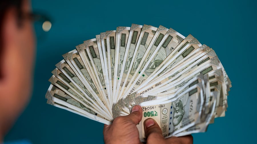 <div class="paragraphs"><p>Image showing a person with Rs 500 notes. For representational purposes.</p></div>