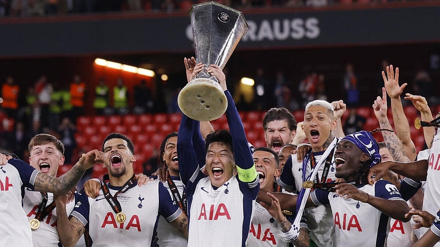 <div class="paragraphs"><p>Tottenham Hotspur's Son Heung-min lifts the trophy with teammates after winning the Europa League Final</p></div>