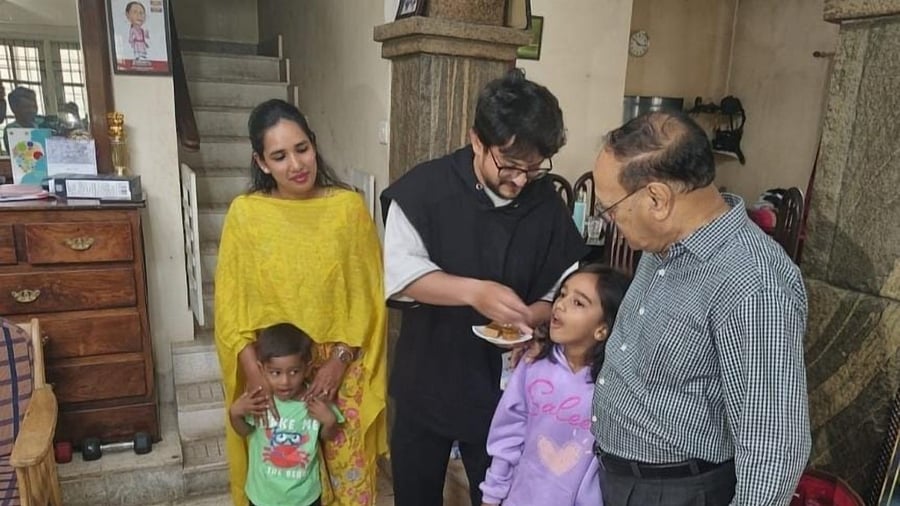 <div class="paragraphs"><p>Family members of Banu Mushtaq celebrate by sharing sweets at their residence in Hassan.</p></div>