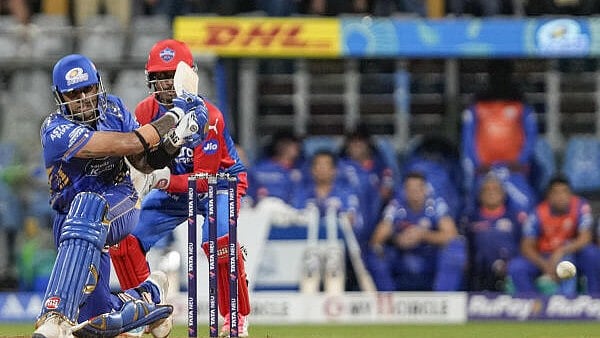 <div class="paragraphs"><p>Mumbai Indians' Suryakumar Yadav plays a shot during the Indian Premier League (IPL) 2025 cricket match between Mumbai Indians and Delhi Capitals</p></div>