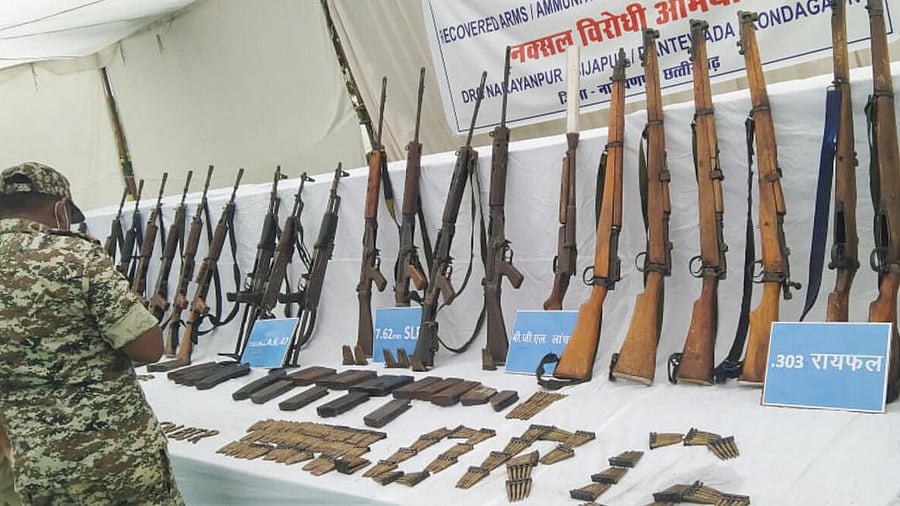 <div class="paragraphs"><p>Arms and ammunitions of Naxals, recovered during an operation on Wednesday , being displayed, in Narayanpur, Chhattisgarh, Thursday, May 22, 2025. CPI-Maoist general secretary Nambala Keshav Rao alias Basavaraju and 26 other Maoists were killed by security forces.</p></div>