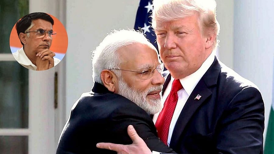 <div class="paragraphs"><p>Modi and Trump seen hugging with an inset image of Pawan Khera</p></div>