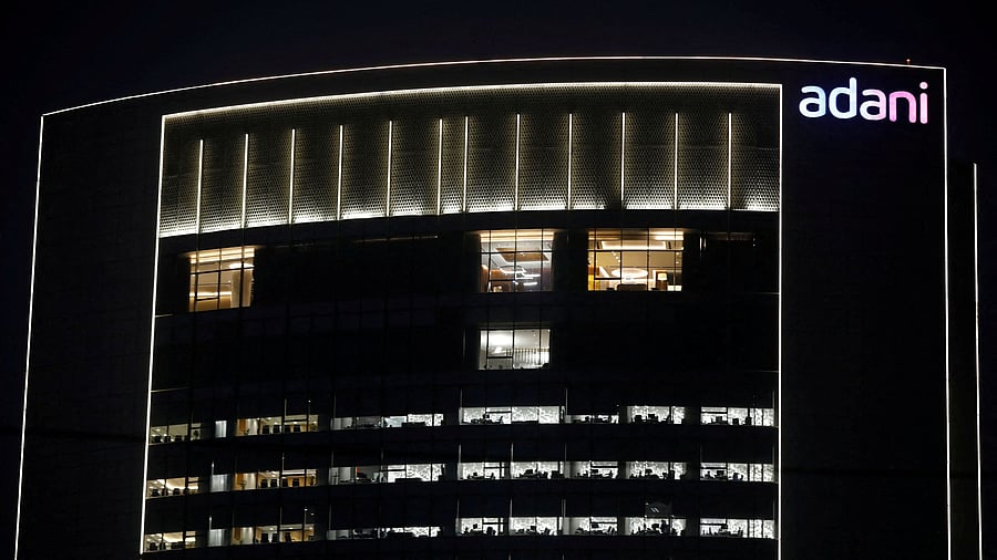 <div class="paragraphs"><p>The logo of the Adani Group is seen on the facade of its Corporate House on the outskirts of Ahmedabad</p></div>