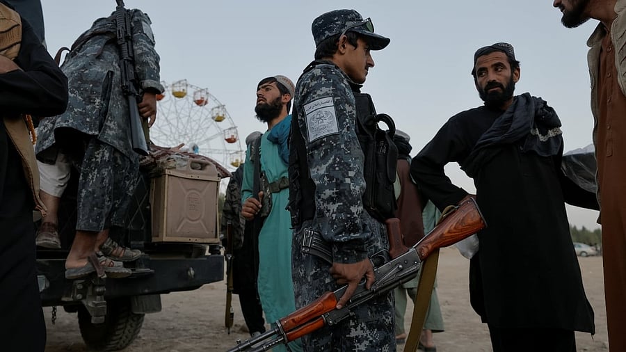 <div class="paragraphs"><p>Taliban fighters in Afghanistan. </p></div>