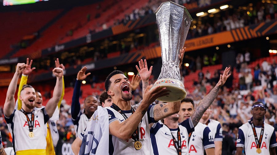 <div class="paragraphs"><p>Tottenham Hotspur's Dominic Solanke celebrates with trophy after winning the Europa League Final </p></div>