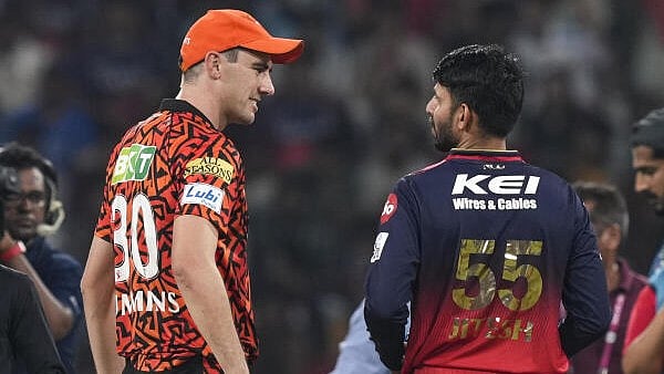 <div class="paragraphs"><p>RCB's Jitesh Sharma and SRH's Pat Cummins at the toss before the IPL T20 cricket match between Sunrisers Hyderabad and Royal Challengers Bengaluru</p></div>