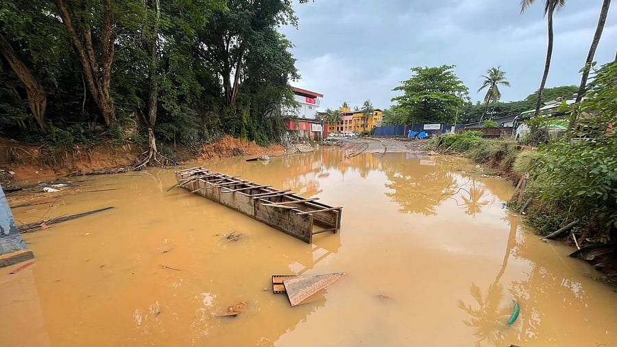 <div class="paragraphs"><p>Rainwater stagnates at a work site for railway under bridge, following heavy rain in Mangaluru on Friday. </p></div>