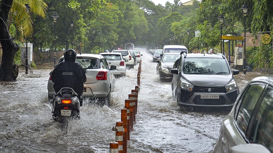 <div class="paragraphs"><p>Representative image showing vehicles wade through a waterlogged road after heavy rain</p></div>