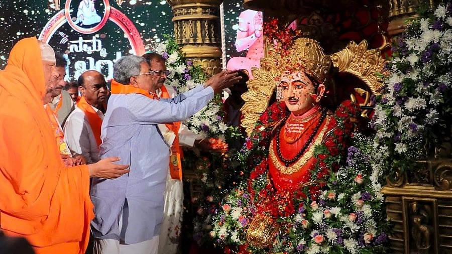 <div class="paragraphs"><p>Chief Minister Siddaramaiah offers floral tributes to the bust of Basavanna during ‘Basava Jayanti - 2025: Namma Nade Anubhava Mantapada Kade’ programme, in Mysuru, on Saturday. Suttur seer Shivaratri Deshikendra Swami is seen</p><p></p></div>