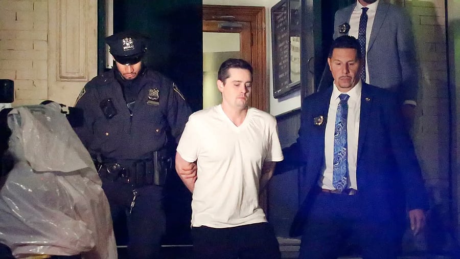 <div class="paragraphs"><p>John Woeltz being taken into custody</p></div>