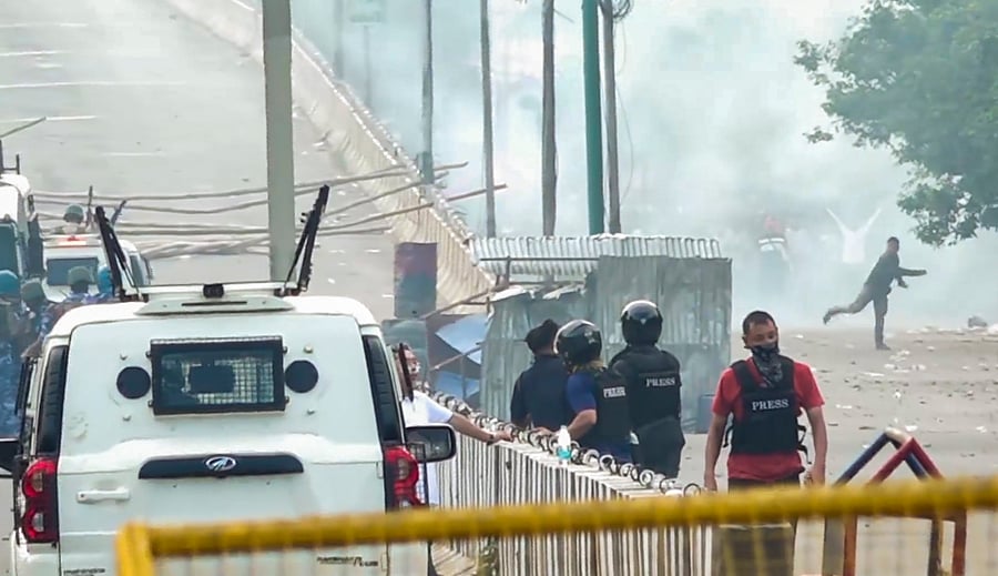 <div class="paragraphs"><p>Security personnel fire tear gas shells a protest in Imphal. For representational purposes.</p></div>