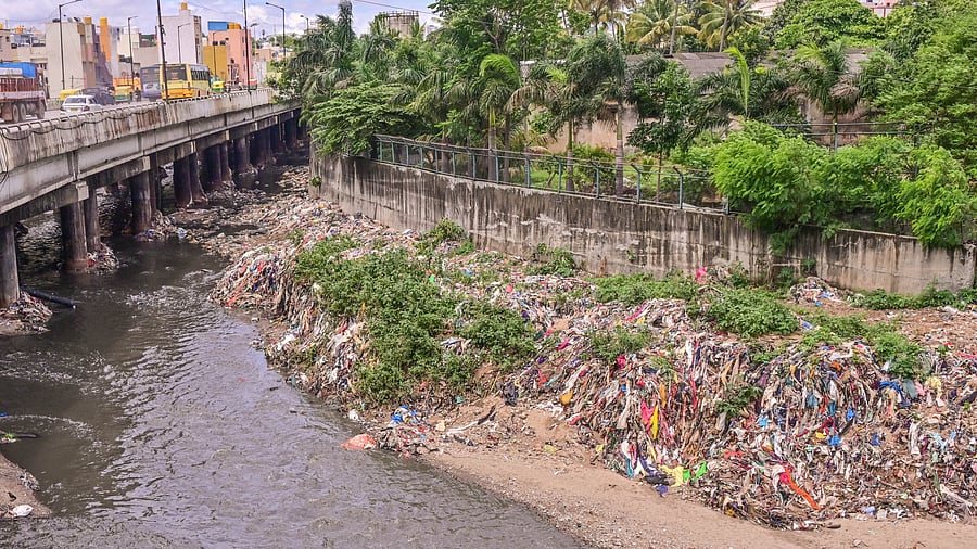 <div class="paragraphs"><p>The rajakaluve near Deepanjalinagar is filled with silt, hampering flow of rainwater. </p></div>