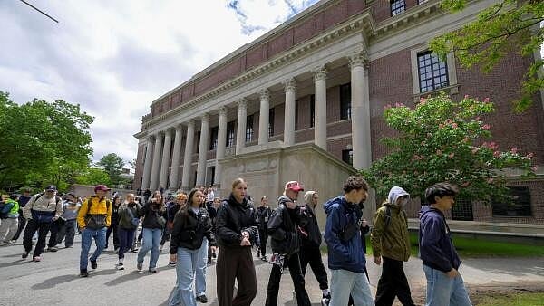 <div class="paragraphs"><p>Students  tour the campus of Harvard University in Cambridge, Massachusetts, US.</p></div>