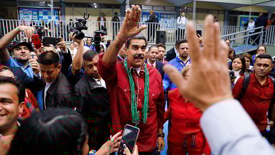 <div class="paragraphs"><p>Venezuela's President Nicolas Maduro gestures after voting in the country's parliamentary elections, in Caracas, Venezuela</p></div>