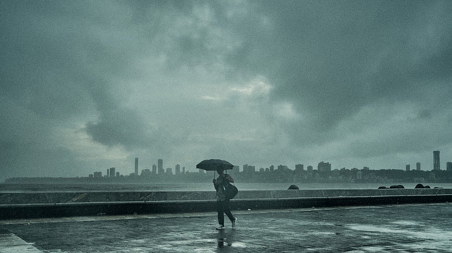 <div class="paragraphs"><p>Image showing a person walking in the rain in Mumbai. For representational purposes.</p></div>