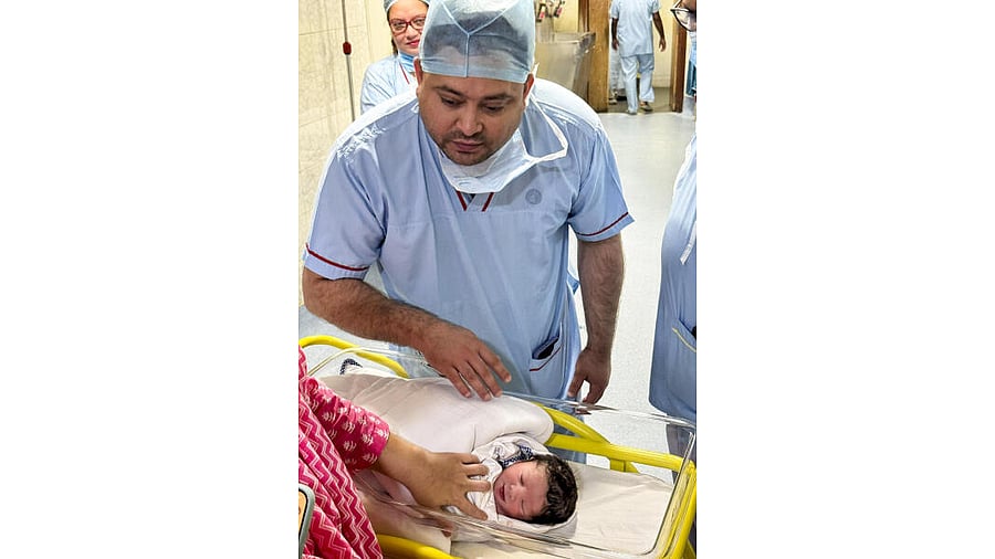 <div class="paragraphs"><p>Tejashwi Yadav and his baby boy</p></div>