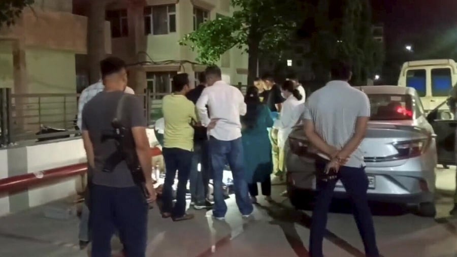 <div class="paragraphs"><p> Police and officials investigate after at the site after seven members of a family from Dehradun allegedly consumed poison and died in a car, in Panchkula, early Tuesday, may 27, 2025. </p></div>