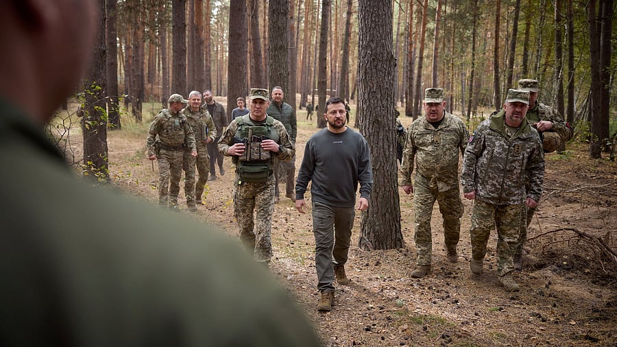 <div class="paragraphs"><p>File Photo: Ukraine's President Volodymyr Zelenskyy visits a position of Ukrainian troops in a front line, amid Russia's attack on Ukraine, in an undisclosed location, Ukraine.</p></div>