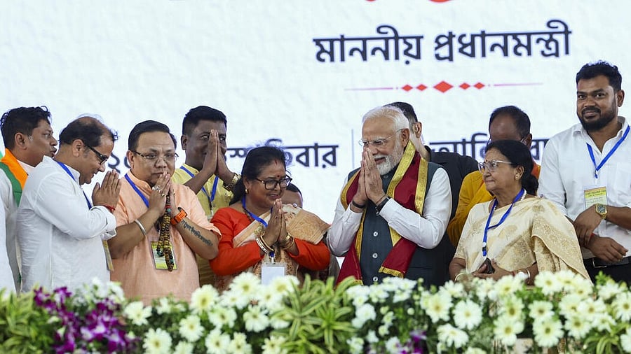 <div class="paragraphs"><p>Prime Minister Narendra Modi being felicitated during a public meeting, in Alipurduar, West Bengal.</p></div>