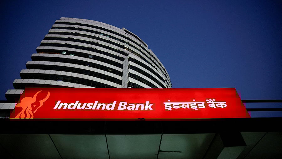 FILE PHOTO: FILE PHOTO: An illuminated signboard of IndusInd Bank is seen outside one of its branches, in New Delhi, India, September 20, 2024. REUTERS/Anushree Fadnavis/File Photo/File Photo