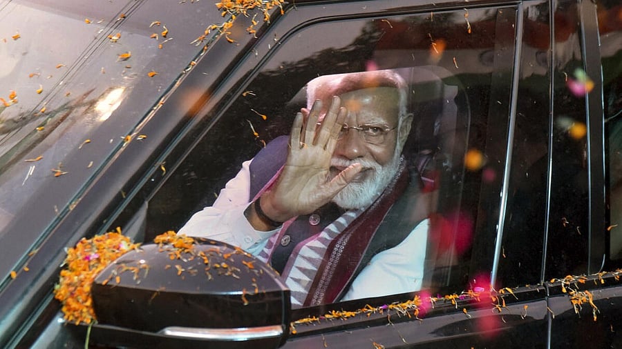 <div class="paragraphs"><p>Prime Minister Narendra Modi waves to supporters during a road show, in Patna, Bihar, Thursday, May 29, 2025.</p></div>