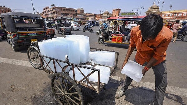<div class="paragraphs"><p>A vendor sells ice on a hot summer day, in Jaipur. </p></div>