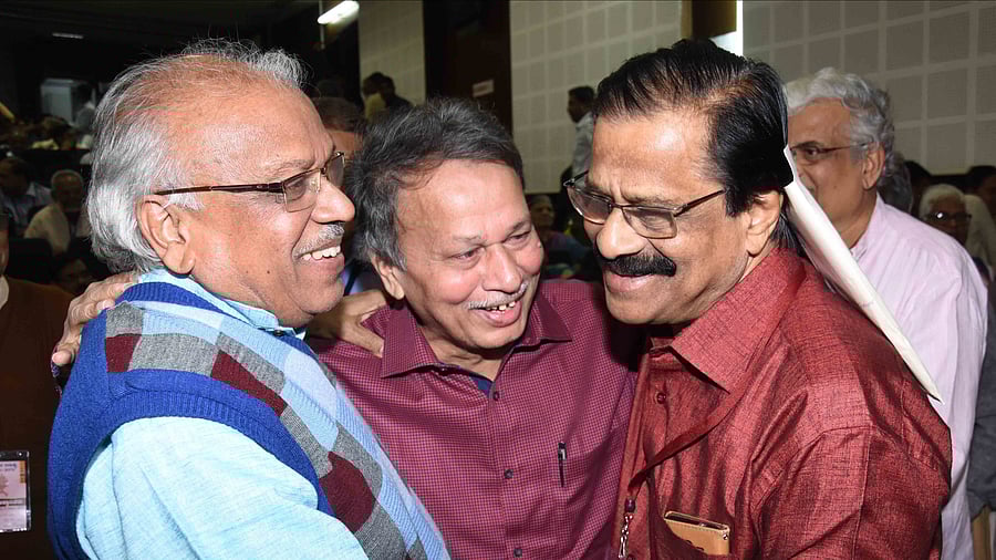Prof HSV shares a lighter moment with writer Baragur Ramachandrappa and poet B R Lakshman Rao.