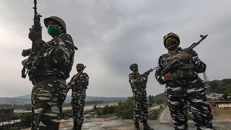 <div class="paragraphs"><p>Central Reserve Police Force (CRPF) jawan keep a watch on the Jammu-Srinagar National Highway ahead of the start of annual Amarnath Yatra. </p></div>