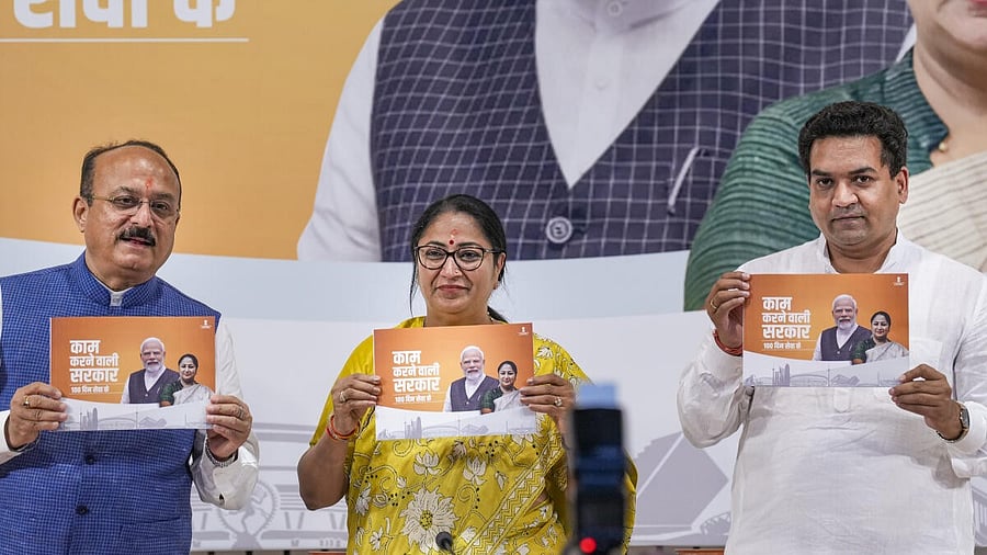 <div class="paragraphs"><p>Delhi Chief Minister Rekha Gupta with cabinet ministers Ashish Sood and Kapil Mishra during a press conference regarding completion of 100 days of her government in the union territory, in New Delhi, Friday, May 30, 2025.</p></div>