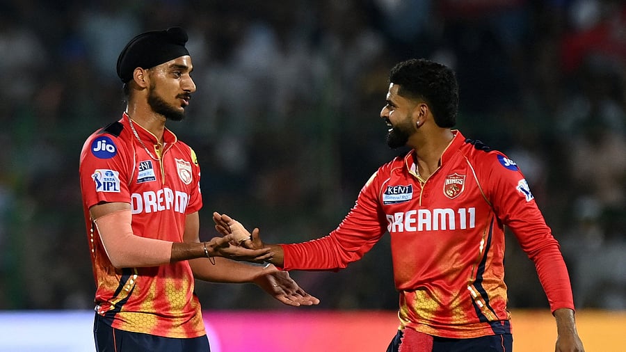 <div class="paragraphs"><p>Punjab Kings' Arshdeep Singh celebrates with Shreyas Iyer.</p></div>