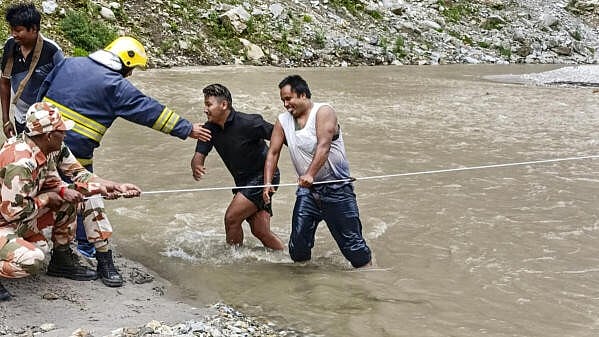 <div class="paragraphs"><p>Rescue work underway  in Mangan district, Sikkim amid heavy rains.</p></div>