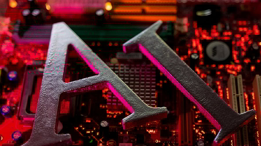 <div class="paragraphs"><p>AI (Artificial Intelligence) letters are placed on computer motherboard in this illustration,</p></div>