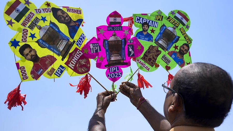 <div class="paragraphs"><p>A kitemaker shows kites adorned with pictures of players from Punjab Kings and Royal Challengers Bengaluru on the eve of the Indian Premier League (IPL) 2025 final cricket match between Punjab and Bengaluru, in Amritsar</p></div>