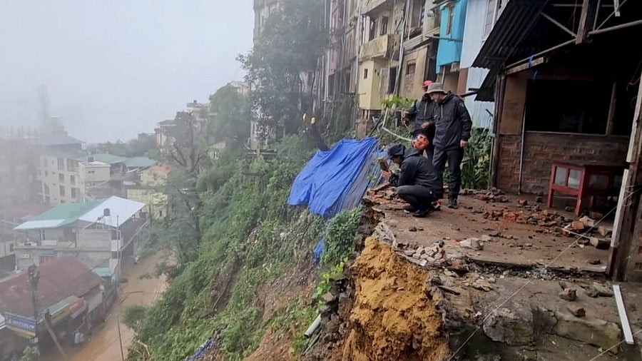 <div class="paragraphs"><p>Rescue and relief work underway after a landslide, triggered by heavy rainfall, in Aizawl </p></div>