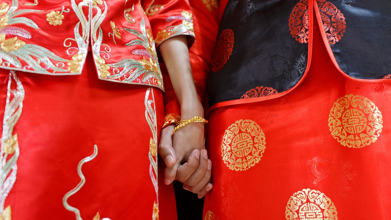 <div class="paragraphs"><p>Image showing a bride and groom in traditional Chinese attire. For representational purposes.</p></div>
