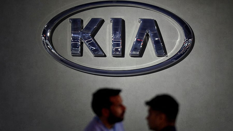 <div class="paragraphs"><p>Visitors walk past the logo of Kia Motors at its pavilion at the India Auto Expo 2020 in Greater Noida. (Representative image)</p></div>