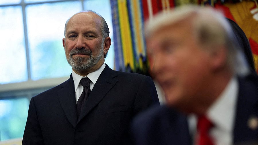 <div class="paragraphs"><p>US Secretary of Commerce Howard Lutnick with President Donald Trump in the Oval Office at the White House in Washington</p></div>